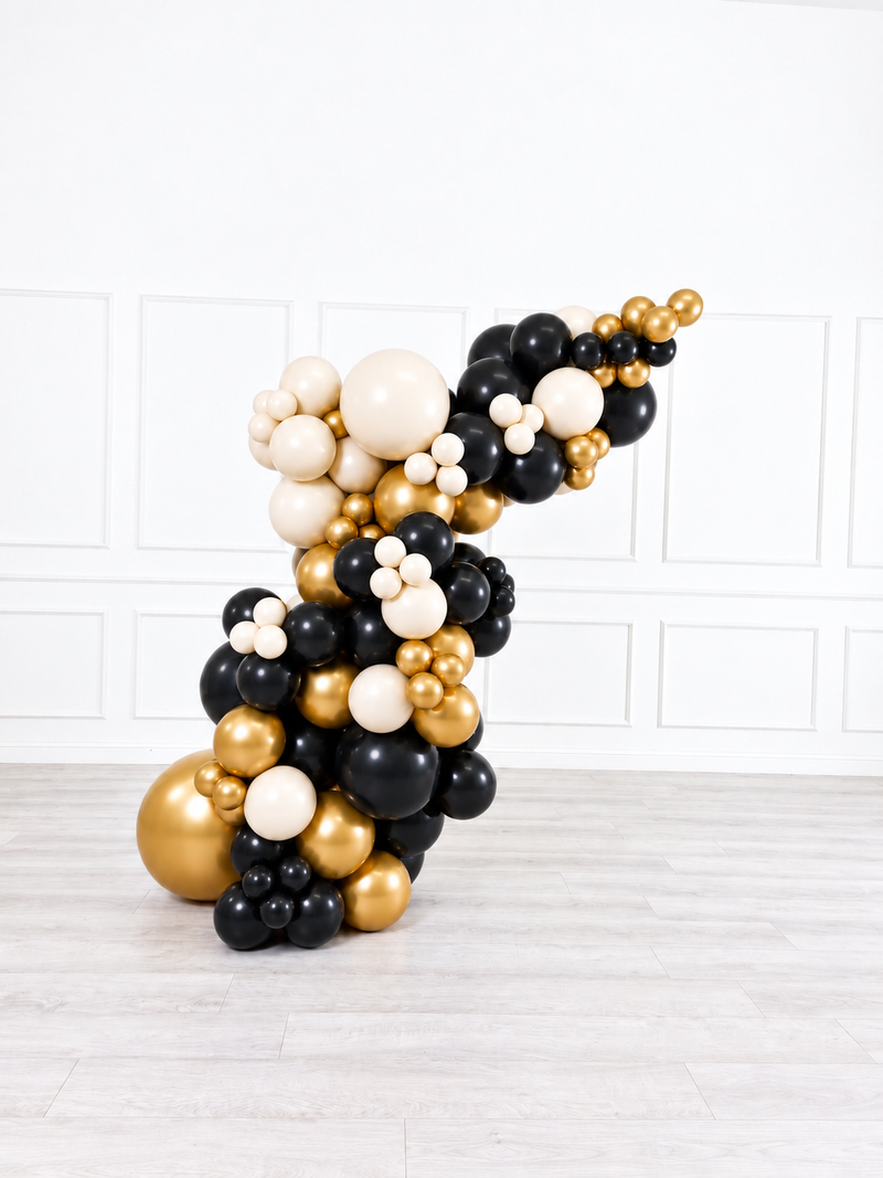 Ana Karina Balloons champagne noir freestanding balloon garland