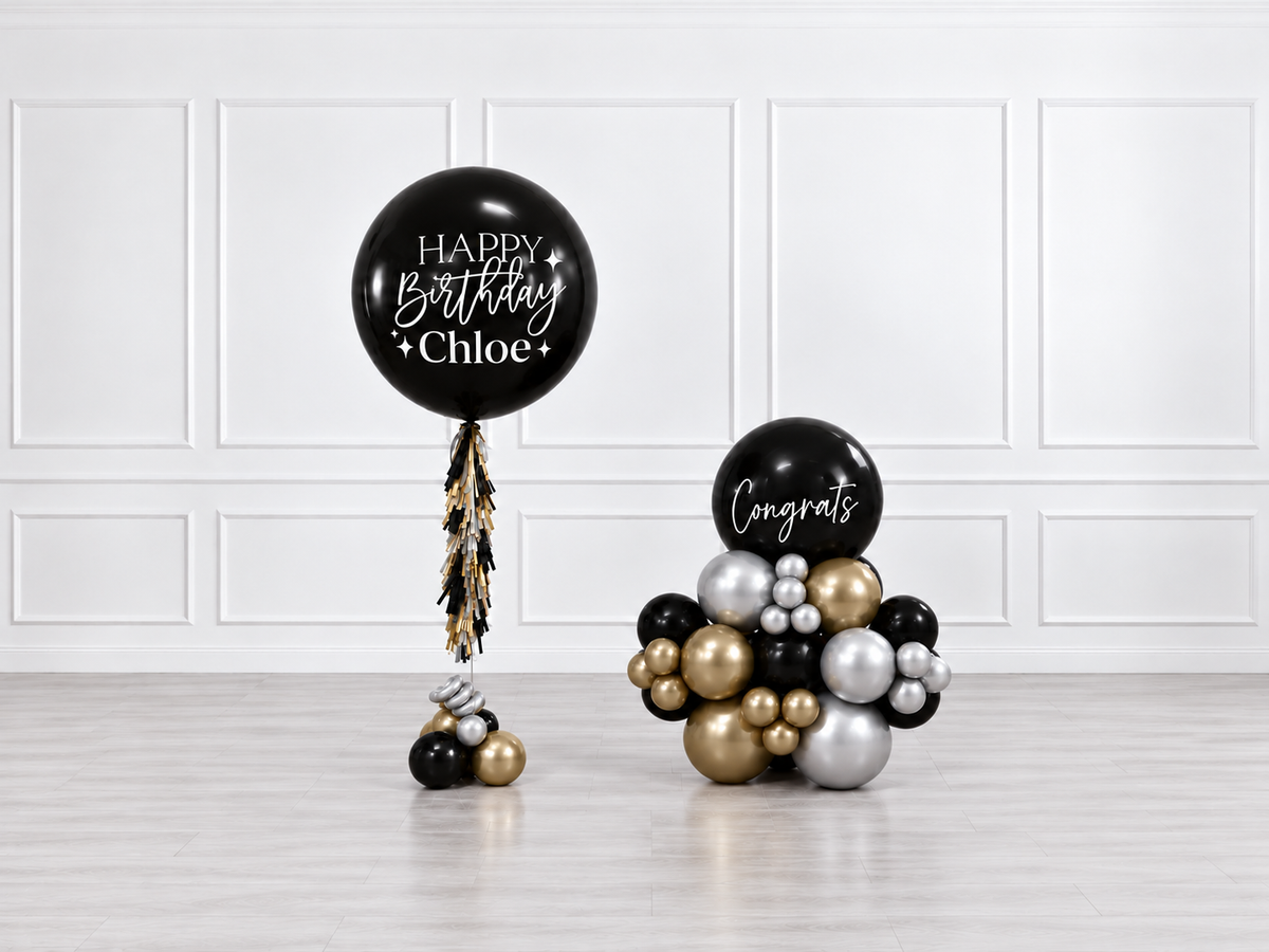 Ana Karina Balloons black tie personalized jumbo balloon tassel and stack balloons