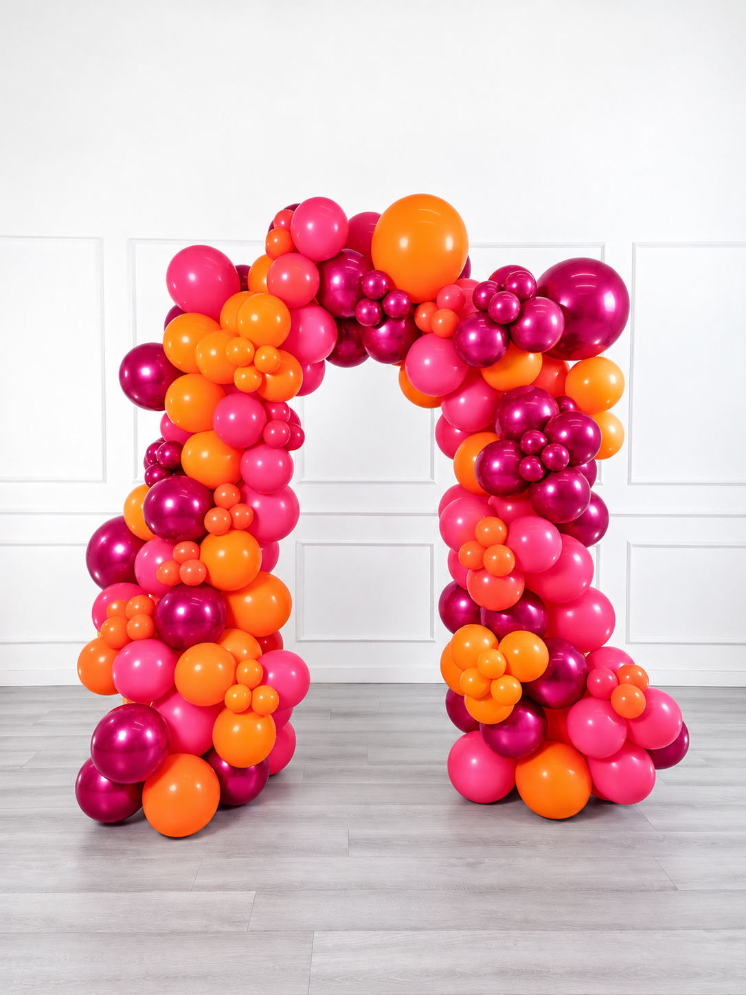 Ana Karina Balloons fire burst organic balloon arch