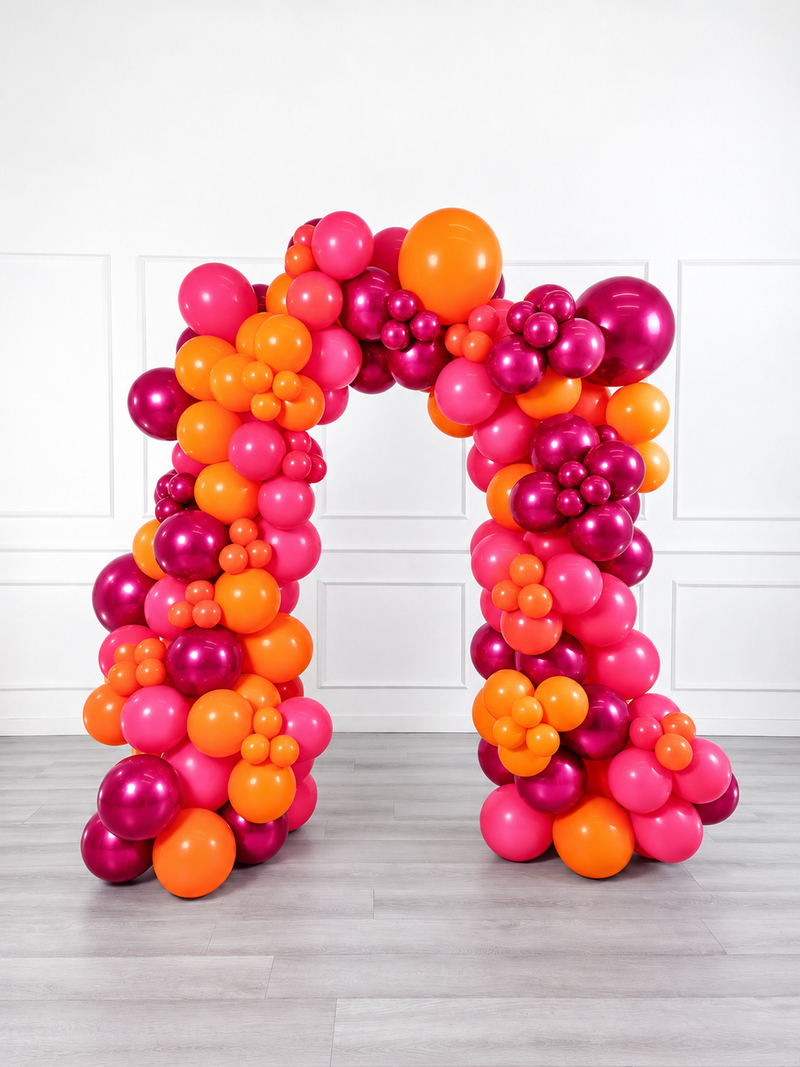 Ana Karina Balloons fire burst organic balloon arch