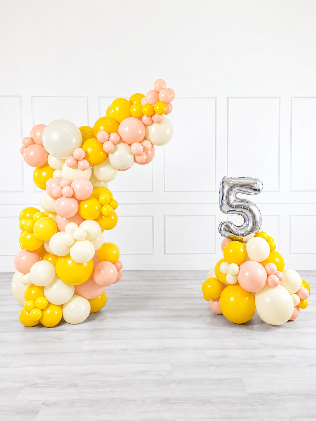 Ana Karina Balloons hello yellow freestanding balloon garland and number stack set