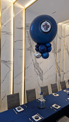 Blue balloon with a logo in a formal dining room setting