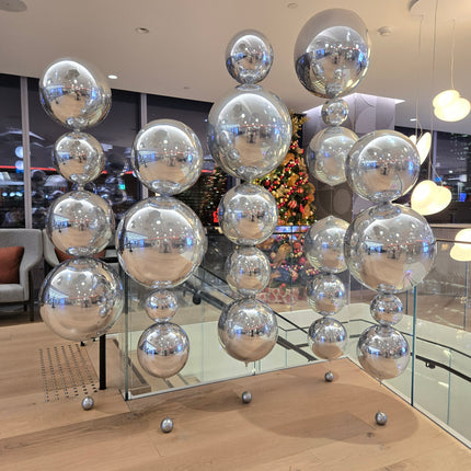 Modern chandelier with silver orbz balloons floating